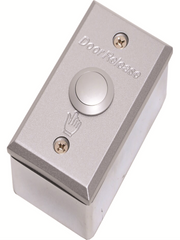 Wide metal door opening exit button on the plaster